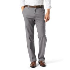 When the occasion calls for a polished look, these versatile khakis will keep you looking stylish all day. Now with Stretch for Performance, No Wrinkles technology, and an All Motion Comfort Waistband, these pants are instant favorites. Stretch fabric blend for performance and comfortable movement Set on waistband and flat-front styling 4-pocket, including single welt button-through back pockets Zipper fly with button closure FIT & SIZING Classic fit sits at the waist Roomy through seat and Slacks Men, Grey Slacks, Dockers Pants, Dockers Men, Flat Front Pants, Gray Pants, Weekend Wear, Stretch Pants, Mens Big And Tall