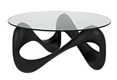 a glass table with an unusual design on it