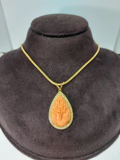 18 Karat Golden Necklace with Carved Coral Pendant and 0.70 Carat Diamonds Coral Pendant, Golden Necklace, Brilliant Cut Diamond, Diamond Cuts, Hand Carved, Coral, Diamonds, Carving, Pendant Necklace