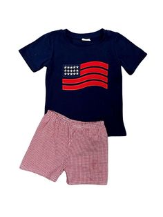 Get ready for the Fourth of July festivities with our Old Glory Boys Navy & Red Patriotic Shorts Outfit. The navy shirt proudly displays the American flag, perfectly coordinating with the red shorts. Whether it's a parade or a family barbecue, your little one will showcase patriotic style in this charming ensemble. And be sure to check out our other must have new arrivals. INCLUDES: Top & Shorts FIT: This item is true to size FABRIC & CARE: Cotton/poly blend Machine washable AVAILABILITY: Ready Red Patriotic Shorts For Summer, Patriotic Blue Shorts With Flag Print, Patriotic Red Shorts, Blue Patriotic Flag Print Shorts, Blue American Flag Print Shorts, Shorts Fit, Patriotic Fashion, The American Flag, The Fourth Of July