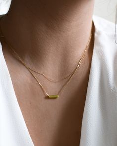 "𝗘𝗮𝘀𝘆 𝗧𝗼 𝗦𝘁𝘆𝗹𝗲, 𝗠𝗮𝗱𝗲 𝗧𝗼 𝗟𝗮𝘀𝘁 Our dainty jade gemstone necklaces are easy to layer and ready to be worn on repeat! Created to last a lifetime, these necklaces will remain evergreen even as the years and trends come and go. 𝗠𝗮𝘁𝗲𝗿𝗶𝗮𝗹𝘀 𝗪𝗲 𝗨𝘀𝗲 This necklace is made entirely with sturdy 14k yellow gold filled or sterling silver pieces and a genuine gemstone pendant. It is safe to wear in the shower, but we recommend avoiding prolonged exposure to chemicals like chlorine to keep your necklace like new! Our jade gemstones are not dyed or artificially colored in any way. The stones and their colors are completely genuine! 𝗟𝗲𝗻𝗴𝘁𝗵 𝗢𝗽𝘁𝗶𝗼𝗻𝘀 We have lengths between 14\" - 20\" available! Generally, we recommend 14\" length for children, someone with a very Dainty Necklaces With Natural Stones For Layering, Dainty Gold Jade Necklace, Minimalist Everyday Necklace With Gemstone Beads, Minimalist Layered Everyday Jewelry, Minimalist Gold Beaded Necklace With Natural Stones, Gold Minimalist Beaded Necklace With Natural Stones, Gold Layered Beaded Necklaces For Gift, Green Jewelry With Delicate Chain For Layering, Minimalist Green Beaded Chain Jewelry