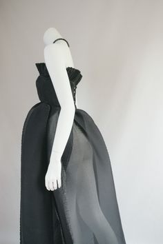 BIOArchival Couture early 1988 Romeo Gigli Pleated Pliss Gown Insane black pleated semi sheer origami dress Fitted ruffle button bust with ruffed detail extravagant semi sheer structural origami skirt Pictures say it all really. Perfect for an event or wedding No tag size Our estimate is XS size UK 6 or 8 with small bust  good vintage condition, moderate wear to be expected of any secondhand or vintage item fading of fabric on buttons and button holes Sheer Vintage Dress, Black Sleeveless Couture Evening Dress, Evening Gown With Pleated Pre-draped Style, Black Gown With Boned Bodice For Gala, Black Gala Gown With Boned Bodice, Black Party Gown With Boned Bodice, Black Organza Gown With Sheer Details, Black Ruffled Evening Gown, Black Ruffled Gown For Evening