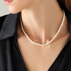 Embrace the subtle elegance of this delicate freshwater pearl necklace, featuring lustrous 4mm natural pearls and a secure with 18K gold lobster clasp. Perfect for adding a refined touch to any outfit, this necklace is ideal for both everyday wear and special occasions. The smaller pearls offer a dainty, classic look that exudes sophistication. Whether worn alone or layered with other necklaces, this piece is a versatile addition to any jewelry collection. Elevate your style with this timeless necklace, designed for those who appreciate understated luxury. Discover understated elegance with our 4mm freshwater pearl necklace, with 18K white gold clasp. Perfect for everyday wear or special occasions. This elegant necklace is crafted with natural freshwater pearls, available in sizes 4mm, 5mm Elegant Pearl Necklace With Round Beads Pendant, Elegant Pearl Necklace For Everyday Elegance, Minimalist Single Strand Pearl Necklace For Formal Occasions, Delicate Round Bead Pearl Necklace For Formal Occasions, Delicate Formal Pearl Necklace With Round Beads, Elegant Pearl Necklace For Everyday Wear, Delicate Pearl White Pearl Necklace For Formal Occasions, Single Strand White Gold Pearl Necklace, Dainty White Gold Pearl Necklace For Formal Occasions