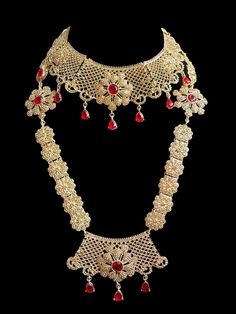 This is the perfect set to give yourself a royal look for your next special occasion! It comes as a full choker, long necklace, passa, earrings and tikka and can be worn separately for a lighter look! 3 Gorgeous colors to pick from ! Elegant Red Bridal Sets For Ceremonial Use, Elegant Red Bridal Sets For Ceremonial Occasion, Red Bollywood Jewelry For Traditional Ceremonies, Bollywood Style Red Jewelry For Traditional Ceremonies, Red Jewelry For Diwali Traditional Ceremonies, Red Jewelry For Traditional Ceremonies And Diwali, Elegant Bridal Sets For Traditional Ceremonies, Red Tikka With Intricate Design For Festive Occasions, Elegant Heavy Necklaces For Traditional Ceremonies