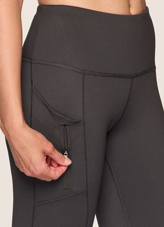 Tackle any cold weather adventure in our Chilled Out Fleece Lined Legging. Quick drying outer fabric combines with soft brushed back interior lining to help keep you warm on your next outdoor adventure while functional tech pockets plus a secure zipper pocket offer the storage space you're looking for. Finished with a high rise waistband and four-way stretch for a high performance lined winter legging that moves with you without being bulky or heavy. Sporty Activewear For Travel With Functional Pockets, Sporty Travel Activewear With Functional Pockets, Stretch Activewear For Travel, Stretch Activewear With Pockets For Travel, Fitted Gray Activewear For Outdoor Activities, Nylon Travel Activewear With Pockets, Nylon Activewear With Pockets For Travel, Fitted Activewear With Pockets In Recycled Polyester, Black Activewear With Side Pockets