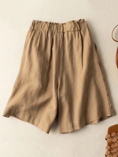 UOOZEE Casual Khaki Bottoms For Beach Season, Casual Pants With Built-in Shorts For Fall, Non-stretch Casual Beach Shorts, Casual Non-stretch Beach Shorts, Casual Non-stretch Vacation Shorts, Casual Non-stretch Shorts For Vacation, Trendy Knee-length Solid Color Bottoms, Trendy Knee-length Beige Bottoms, Non-stretch Wide Leg Shorts In Solid Color