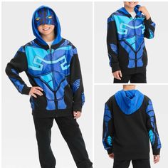 Dc Comics Boys' Blue Beetle Zip-Up Sweatshirt Color Blue & Black Retail $23 Add Some Superhero Flair To Your Child's Cool-Weather Wardrobe With This Dc Comics Blue Beetle Zip-Up Sweatshirt. Designed Like Blue Beetle's Armor In Blue And Black, This Regular-Fit Sweatshirt Is Made Of A Midweight Cotton Blend To Keep Your Young Dc Fan Warm And Toasty. It Boasts Ribbed Trim On The Long Sleeves And Below-Waist Hem For A Neat Look, Along With An Attached Hood Featuring An Eye Mask Design On The Forehea Blue School Tops With Character Print, Black Top With Cartoon Print For Cosplay, Blue Character Print Tops For School, Black Cartoon Print Top For Cosplay, Blue Fandom Top For Fan Merchandise, Blue Character Print School Tops, Blue Anime Print Tops For Fan Merchandise, Blue Hooded Windbreaker With Double-lined Hood, Superhero Long Sleeve Winter Hoodie