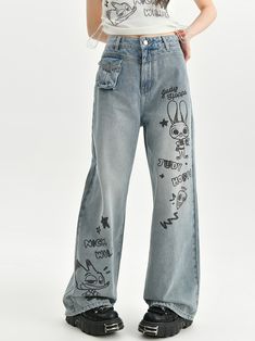 Step into the world of Zootopia with these adorable Judy and Nick print high-waist wide-leg jeans! Made from high-quality denim, these jeans feature a vibrant blue color and a fun print of Judy and Nick, the beloved characters from the movie. The high waist design offers a flattering fit, while the wide-leg style adds a touch of retro charm. Pair these jeans with your favorite top for a playful and stylish look that's perfect for any casual outing.  Please note that this product includes only th Wide Leg Pants With Graphic Print For Spring, High Waist Denim Bottoms With Letter Print, High-waist Denim Bottoms With Letter Print, Wide Leg Cotton Pants With Graphic Print, Cotton Wide Leg Pants With Graphic Print, Trendy Denim Blue Wide-leg Flare Jeans, Trendy Wide-leg Denim Blue Flare Jeans, Trendy Wide-leg Flare Jeans In Denim Blue, Baggy Straight Leg Jeans With Graphic Print