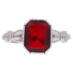 Size: 4 1/4 Sizing Fee: Up 2 sizes for $30 or Down 2 sizes for $30 Era: Vintage Metal Content: 10k White Gold Material Information Glass Color: Red Style: Solitaire Features: Milgrain Detailing Measurements Face Height (north to south): 11/32" (8.4mm) Rise Above Finger: 3/16" (4.1mm) Weight: 1.1 Grams Stamps: 10k, MS Condition: Pre-Owned Condition Note: The glass is worn/abraded from previous use. Onyx Colour, Amethyst Ring Engagement, Yellow Gold Solitaire, London Blue Topaz Ring, Rise Above, La Face, Modern Ring, Red Style, Glass Color