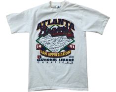 Atlanta Braves 1991 Fan Appreciation Vintage Mlb Baseball National League Champions Chipper Limited Edition Signature Made In Usa T-Shirt Vintage Graphic Print T-shirt For Sports Events, Vintage T-shirt For Sports Season Fan Gear, Vintage Fan Gear T-shirt For Sports Season, Throwback Crew Neck Pre-shrunk T-shirt, Vintage Fan Gear T-shirt With Graphic Print, Vintage Graphic Print Fan Gear T-shirt, 90s Crew Neck T-shirt For Fan Gear, 90s Style T-shirt For Fan Gear With Crew Neck, Vintage Graphic Print T-shirt For Fan Gear