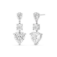 Perfect for any special day, this pair of diamond earrings is sure to give your look a dazzling finish. Each dangling earring features a trio of diamonds in pear, round, and heart shapes; together, they reflect light in an extra brilliant way. Elegant Dangle Heart Earrings For Anniversary, Elegant Dangle Heart Earrings For Wedding, Elegant Diamond White Heart Earrings With Prong Setting, Elegant Heart-shaped Brilliant Cut Earrings, Heart Cut Diamond Jewelry With Matching Earrings, Diamond Heart Drop Earrings Fine Jewelry, Elegant Formal Heart Earrings With Prong Setting, Elegant Formal Heart Earrings, Elegant Diamond White Heart Earrings For Wedding