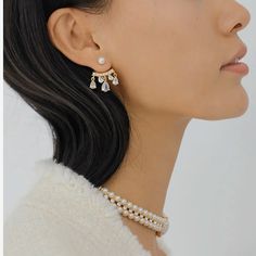 The Elizabeth Pear Earrings feature two glamorous pearls framed in a classic design. Perfect for any occasion, these earrings provide an elegant, delicate look perfect for a wedding or a night out. Expertly crafted, they will add a touch of sophistication to any ensemble. To keep your jewellery in the best condition, we recommend giving it a good care over time. By using a soft, lint-free jewellery cloth, you can remove blemishes that result from body oils, perfumes and lotions. Also remember try not to expose your jewellery in the open air. Our branded dusty bag or your jewellery box will keep them last longer. If you go to gym or spa, remember to take them off, because water or sweat will also damage them. Luxury White Jhumkas With Pearl Drop, Evening Yellow Gold Pearl Earrings With Pearl Charm, Classic 14k Gold-filled Pearl Earrings, Go To Gym, Luxury Gold-tone Pearl Drop Earrings, Pearl-embellished Cubic Zirconia Drop Earrings, Luxury Pearl Drop Gold-tone Earrings, Blemish Remover, Pear Earrings