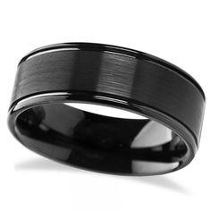 a black ceramic ring with a satin finish on the outside and an inlay design