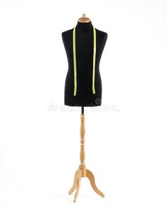 a mannequin with a yellow ribbon on it's neck