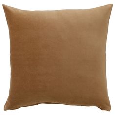 a brown pillow on a white background