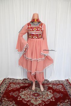 Beautiful afghan dress - traditional bridal afghan dress - Vintage Kuchi tribal Morden Dress - Afghan Dress For Women - Rare find as this is a vintage deess Measurements : UK SIZE 8 - 14 (SIZE MEDIUM ZIP) AND BELT TO ADJUST  Shoulder: 16inch Waist: 20 inch  Body: 15inch Arm length: 23 Material : Dusty Pink Georgette Material with Silver tassel lace at the edge of the dress, and Crepe material is used for the shalwar, highest quality. - Expect imperfections as this is a vintage item, it has been made with care Hand stitched and perfectly made . Dress multi coloured embroidery lace    Back of the dress : includes a zip and belt for that perfect fit  Care - Please hand wash this item as it is a vintage item most stitches are done with hand - do not use any harsh chemicals on the item when was Arab Clothing, Middle Eastern Clothing, Arabic Clothing, Georgette Material, Tassel Lace, Afghan Dress, Dress Traditional, Crepe Material, Afghan Dresses