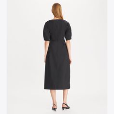 In crisp cotton-poplin, this mid-calf dress creates a feminine shape with a wide V-neckline, gently puffed sleeves, and a sweeping skirt. An elegant choice for day or night. Classic Spring V-neck Dress, Formal Cotton V-neck Midi Dress, Formal V-neck Cotton Midi Dress, Camp Dress, Eyelet Skirt, Jacquard Skirt, Mid Calf Dresses, Scoop Neck Dress, Poplin Dress