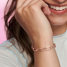 Wear your mantra on your wrist. Our 14k rose gold-plated Pandora ME Medium-Link Chain Bracelet holds endless styling possibilities. The bracelet features three openable links, designed with a grooved surface to set them apart, styling links and a carabiner clasp closure. First customise your link chain: one set of interlocking styling links can be swapped out between each openable link for four small interlocking links, a styling double link or one styling link – keep the original length or adjust it to suit you. Once you’ve curated your link chains, remix your look with up to two meaningful medallion charms or up to eight mini dangle charms on each openable link, or with one medallion charm per styling link to show the world what you're about. Please note this item is only compatible with Rose Gold Link Bracelet With Adjustable Chain, Rose Gold Bracelet With Solid Link As A Gift, Rose Gold Link Chain Bracelet With Adjustable Chain, Modern Rose Gold Chain Bracelet With Rectangular Links, Trendy Rose Gold Chain Jewelry, Formal Rose Gold Chain Link Bracelet, Luxury Rose Gold Link Bracelets, Luxury Rose Gold Chain Bracelet For Everyday, Rose Gold Oval Link Paperclip Bracelet