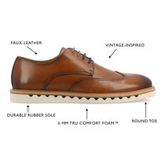 Introducing the Evander derby shoe from Vance Co., a seamless fusion of style and comfort with its 1-inch heel, lace-up closure, and classic round toe design. Crafted from faux leather this style offers a fashionable choice for various occasions. The mesh lining, 6 mm Tru Comfort Foam™ footbed, and rubber outer sole ensure breathability, comfort, and support, making the Evander a versatile and conscious addition to your footwear collection. Wingtip Oxfords With Removable Insole For Derby, Derby Wingtip Oxfords With Removable Insole, Lace-up Shoes With Rubber Sole For Derby, Classic Lace-up Derby With Goodyear Welt Construction, Brogue Lace-up Shoes For Derby With Round Toe, Brogue Lace-up Shoes With Round Toe For Derby, Low-top Oxfords With Contrast Sole, Brown Lace-up Shoes With Contrast Sole For Derby, Cap Toe Lace-up Shoes With Contrast Sole For Derby