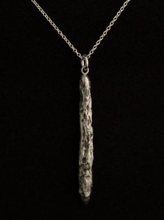 an elegant silver jewelry that represents the Oumuamua. more about Oumuamua on Wikipedia, https://en.wikipedia.org/wiki/%CA%BBOumuamua Oumuamua interstellar object pendant from solid sterling silver hand carved using the lost wax method. Size: 47mm/1.85 inch high. comes on a 18 inch/ 45 cm long sterling silver chain.If you would like a 20 inch / 50 cm long chain please leave me a note in the message to seller form when checking out. If you choose the 14k goldplated option, it comes with an 18 in Elegant Silver Jewelry, Lost Wax, Interstellar, Long Chain, Sterling Silver Chain, Solar System, Silver Chain, Arrow Necklace, Black Friday