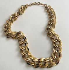 "Vintage 80's heavy gold link chain necklace Adjustable from about 19-1/2\" to 20-1/2\" Good vintage condition This piece is a part of our Little Vintage Paris Collection full of treasures sourced in the fashion capital of the world! We hope that you enjoy wearing and gift-giving these carefully curated items which have arrived just in time for the holiday season! NOTE: Please bear that in mind that, when you purchase vintage, it might not be perfect, but it will be authentic. No returns will be Vintage Chain Necklace As Gift, Vintage Gold Necklace With Chain Strap, Retro Gold Jewelry With Adjustable Chain, Chunky Link Gold Necklace, Gold Chunky Chain Link Necklace, Gold Chunky Link Necklace, Vintage Chain Necklace With Chain Strap As Gift, Vintage Gold Jewelry With Chain Strap, Gold Metal Chain Necklace Costume Jewelry