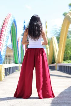 All items are shipped Thailand Post. Free upgrade when you buy 2 items or more.The USA only. Please leave a phone number with orders . Made in 100% cotton soft , light and very comfy . These bell bottom pants have a cute design .They allow you to adjust the bottom of the hemline with 4 ties on the inside of the leg .Tighten the ties to create a draped look , tie loosely for a bell bottom hemline . Fantastic flare of 50''inches . The pants are half lined with an elastic waist band .They flare out Red Wide Leg Pants For Summer, Red Wide Leg Cargo Pants, Red Cotton Wide Leg Pants With Loosely Fitted Hips, Red Wide Leg Cotton Pants, Casual Red Flare Pants, Red Stretch Cotton Harem Pants, Red Wide Leg Cotton Harem Pants, Red Full-length Wide Leg Pants For Summer, Red Full Length Wide Leg Summer Pants