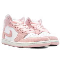 The Air Jordan 1 Mid SE mixes white, legend pink, and sail for this classic iteration. This design features leather-covered toe boxes and side panels on the upper paired with suede on the mudguards, heels, and collar. Suede legend pink covers the signature swoosh on each side with Jordan branding at the tongue and collar. DUE TO THE LIMITED NATURE OF THIS PRODUCT, ALL SALES ARE FINAL. THIS ITEM IS NOT ELIGIBLE FOR DISCOUNTS OR SPECIAL PROMOTIONS. Leather & Suede upper with rubber sole Lace-up front Cushioned tongue Padded mid-cut collar Perforated toe Signature Swoosh at the side Foam midsole All sizes are listed in U.S. Standard sizing unless stated otherwise Style No: FN5215-161 Pink Air Jordan, White Suede Sneakers With Rubber Heel Cap, Pink Leather High-top Sneakers With Textured Sole, Pink High-top Lace-up Sneakers With Textured Sole, White Suede Sneakers With Speckled Midsole, Pink Leather High-top Sneakers With Gum Sole, Pink Leather High-top Custom Sneakers, Pink Lace-up High-top Sneakers With Textured Sole, Pink Sporty Custom Sneakers With Speckled Midsole