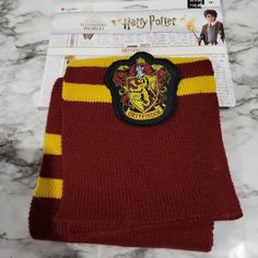 New Harry Potter Gryffindor Scarf! Knit Scarf With Griffindor Patch Harry Potter Gryffindor Scarf, Harry Potter Robes, Gryffindor Scarf, Harry Bertoia, Harry Potter Hufflepuff, Slytherin House, Scarf Knit, Harry Potter Gryffindor, Wizarding World