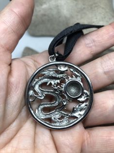 Amazing huge beautiful Dragon amulet pendant design Lovely handmade silver work In all stainless steel Over 2 inch All jewelry is shipped in a nice gift box. Check out our over a THOUSAND great reviews Dragon Design Amulet Jewelry Gift, Dragon Design Amulet Jewelry As Gift, Amulet Jewelry With Dragon Design For Gift, Round Dragon Design Jewelry For Gifts, Dragon Design Jewelry For Gift, Dragon Design Jewelry Gift, Round Dragon Design Necklace For Gift, Round Pewter Jewelry As Gift, Round Pewter Jewelry Gift