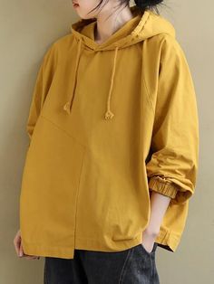 Artistic Retro Solid Color Split-Joint Hooded Long Sleeves Hoodies Oversized Yellow Sweatshirt For Spring, Oversized Yellow Spring Sweatshirt, Yellow Cotton Hoodie With Pockets, Yellow Hoodie With Pockets For Fall, Oversized Yellow Hooded Hoodie, Yellow Fall Hoodie With Pockets, Fall Yellow Hoodie With Pockets, Oversized Yellow Sweatshirt With Drawstring Hood, Oversized Yellow Casual Sweatshirt