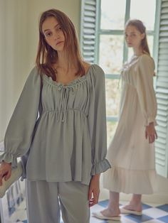 Editor's Notes The two piece pajama set has a soft, romantic pastel color and a lovely ribbon and ruffles at the neckline. - Comfortable wear with a waistband- Ruffles on the bottom hem- Loose, comfortable fit- Shirring on shoulders and chestMeasurements(in.)M / LTop- Length: 23.03 in. / 23.81 in.- Chest: 16.53 in. / 17.51 in.- Sleeve: 23.03 in. / 23.52 in.Bottom- Length: 36.02 in. / 37.01 in.- Rise: 12.01 in. / 12.40 in.- Hip: 8.36 in. / 22.24 in.- Waist: 12.59 in. / 13.38 in.*Price v Feminine Long Sleeve Ruffled Sleepwear, Feminine Long Sleeve Sleepwear With Ruffles, Ruffled Long Sleeve Sleepwear For Loungewear, Long Sleeve Ruffled Sleepwear For Loungewear, Spring Ruffled Sleepwear For Loungewear, Two Piece Pajama Set, Christmas Pajamas, Mens Outerwear, Men Shoes Size