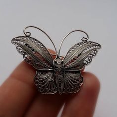 "Silver Butterfly Brooch Mariposita - Sterling Silver Brooch - Filigree Brooch - Handmade Brooch - Butterfly Jewelry - Gift Idea for Her Filigree - delicate jewellery technique made from silver or golden threads \"embroidering\" kind of metalwork lace that is specific to Spain, especially an Andalusian town Cordoba, where they call it a cordobese filigree. This craftsmanship has been passed from generation to generation, nonetheless nowadays there are very few craftsmen left who know to perform Intricate Pendant Brooches As Gifts, Gift Brooches With Intricate Pendant Design, Victorian Handmade Pendant Brooches, Vintage Handmade Butterfly Brooch, Handmade Vintage Butterfly Brooch, Silver Butterfly Brooch For Wedding, Handmade Silver Pins, Handmade Victorian Brooches As Gifts, Handmade Victorian Brooches For Gift