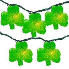 four leaf clover string lights on a white background