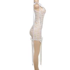 Please refer to our sizing chart for a guideline when choosing a size. 5 business days order processing time. 90% polyester 10% spandex Backless Mini Dress With Lace Patchwork, Elegant Sheer Lace Bodycon Dress, Lace Party Dress With Tie Back, Sheer Lace Backless Dresses, Lace Mini Dress With Tie Back, Backless Sheer Lace Mini Dress, Sheer Backless Lace Mini Dress, Embroidered Lace Mini Dress, Fitted Mini Dress With Lace Closure