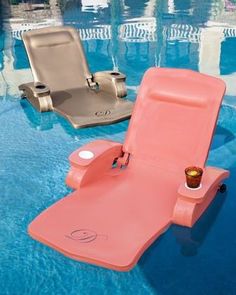 an inflatable lounge chair next to a swimming pool with a drink on it