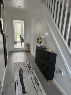 the hallway is clean and ready to be used as a living room or dining area