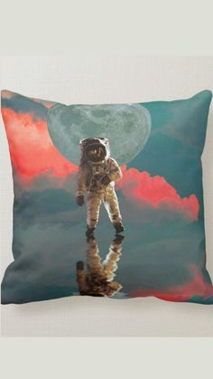 an astronaut floating in the sky on a pillow