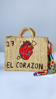 Handmade of henequen and beautifully embellished by artisans in Mexico these bags are a must have for the summer or for a unique gift and special occasion . Picture bag size is 9.5 inches some color variation may come in handbags different then pictures.   Small bag dimensions  Material: Henequen. Height: 9.5 inches Width: 12 inches Depth: 5 inches Medium bag dimensions Material: Henequen. Height: 12 inches Width: 14 inches Depth: 5 inches embroidered straps to be used shoulder or crossbody. var Mexican Made Purse, Handmade Mexican Gifts, Welcome Gifts Mexico, Artisan Bag For Summer Gift, Artisan Rectangular Straw Bag, Bohemian Brown Beach Bag For Gift, Handmade Brown Beach Bag As Gift, Large Handmade Shoulder Bag For Summer, Traditional Rectangular Beach Bag For Gift