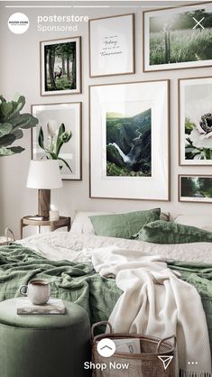 a bedroom with pictures on the wall above it and a bed covered in green sheets