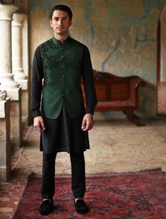 Elevate your ensemble with our celadon green raw silk waistcoat, paired with a classic black kurta pajama. Ideal for grooms, formal events, and parties, exuding sophistication and style with a touch of luxury.In a symphony of sophistication and individuality, the celadon green raw silk fabric waistcoat commands attention with its unique hue and intricate embroidery that graces its front. This distinctive color exudes a sense of refinement and exclusivity, setting the stage for a truly memorable Portsmouth Virginia, Embroidered Waistcoat, White Waistcoat, Waistcoat Designs, Black Kurta, Mens Waistcoat, Men's Waistcoat, Waistcoat Men, Raw Silk Fabric