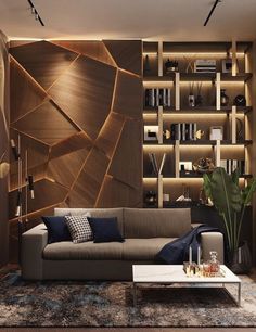 a living room filled with lots of furniture next to a wall mounted bookshelf