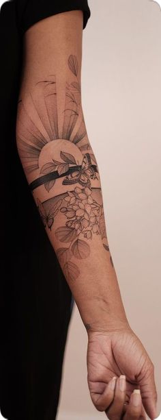 a person with a tattoo on their arm