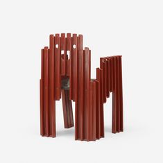 an abstract sculpture made out of red plastic tubes and wood sticks with holes in the middle