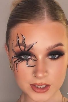 Description: Turn heads this Halloween with a bold and eerie spiderweb-inspired makeup look. Featuring a dramatic smoky eye, glossy dark lips, and an intricately detailed web drawn over your eyes, this look is both spooky and glam. The soft blending of black and deep red shades adds a touch of mystery, while the spiderweb design creeping across your face gives an extra fright factor. Pair it with a sleek costume for an unforgettable Halloween transformation! Ideal for those who want to make a stunning, creative statement. Spider Makeup Halloween Easy, Spiderweb Makeup, Halloween Spider Makeup, Glitter Halloween Makeup, Halloween Transformation, Spider Lady, Unique Halloween Makeup, Maquillage Halloween Simple, Spider Makeup