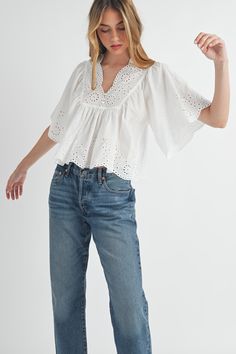 White blouse featuring a v-neck and eyelet detail. Model is wearing a small. Eyelet Outfit Aesthetic, Black Eyelet Top, Eyelet Blouse, Blouse Plus Size, Eyelet Top, Jumpsuit Shorts Rompers, Outfit Aesthetic, Matching Top, Romper Pants