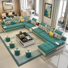 a living room filled with lots of blue furniture