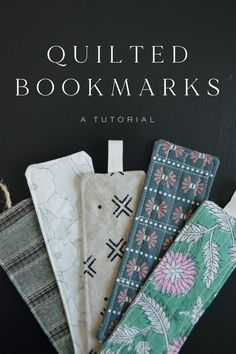 quilted bookmarks are stacked on top of each other with text overlaying them