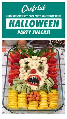 a halloween party snack with carrots and cauliflower in the shape of a face