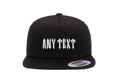 Elevate your hat game with this personalised TRAPSTAR inspired snapback cap. The sleek black polyester material paired with a twill fabric type and Yupoong brand ensures durability and style. The one size fits all design makes it suitable for both unisex adults, perfect for workwear, sports or casual occasions. The embroidered font style adds a touch of fashion and uniqueness to this cap. The TRAPSTAR theme is reflected through the design, making it a must-have for fashion enthusiasts. Take your Customizable Trucker Hat With Curved Brim For Streetwear, Customizable Curved Brim Trucker Hat For Streetwear, Customizable Flat Bill Baseball Cap For Streetwear, Customizable Black Casual Snapback Hat, Streetwear Trucker Hat With Custom Logo And Flat Bill, Customizable Flat Bill Hat For Streetwear, Custom Logo Snapback Baseball Cap, Black Hat With Custom Logo For Streetwear, Customizable Adjustable Baseball Cap For Streetwear