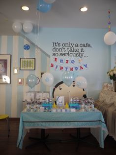 a birthday party with balloons and decorations